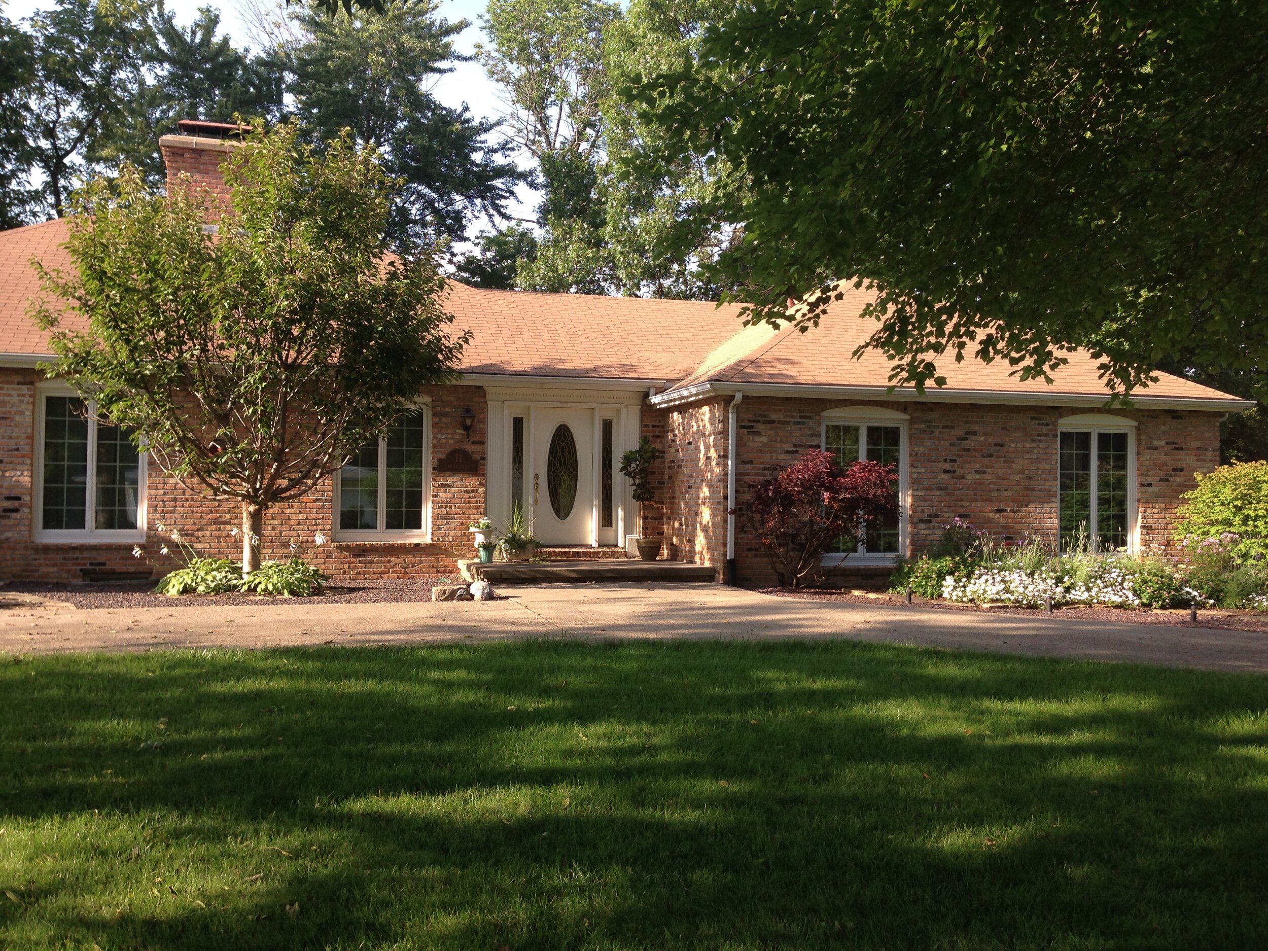 Our house with white vinyl windows